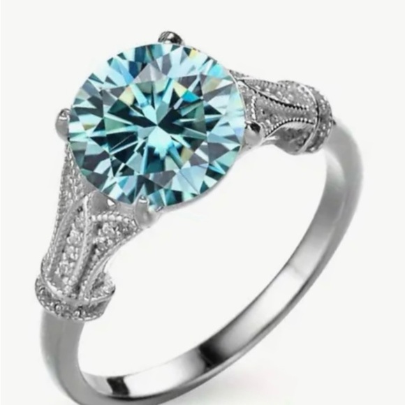 Elegant Silver and Blue Gemstone Ring - Picture 1 of 5